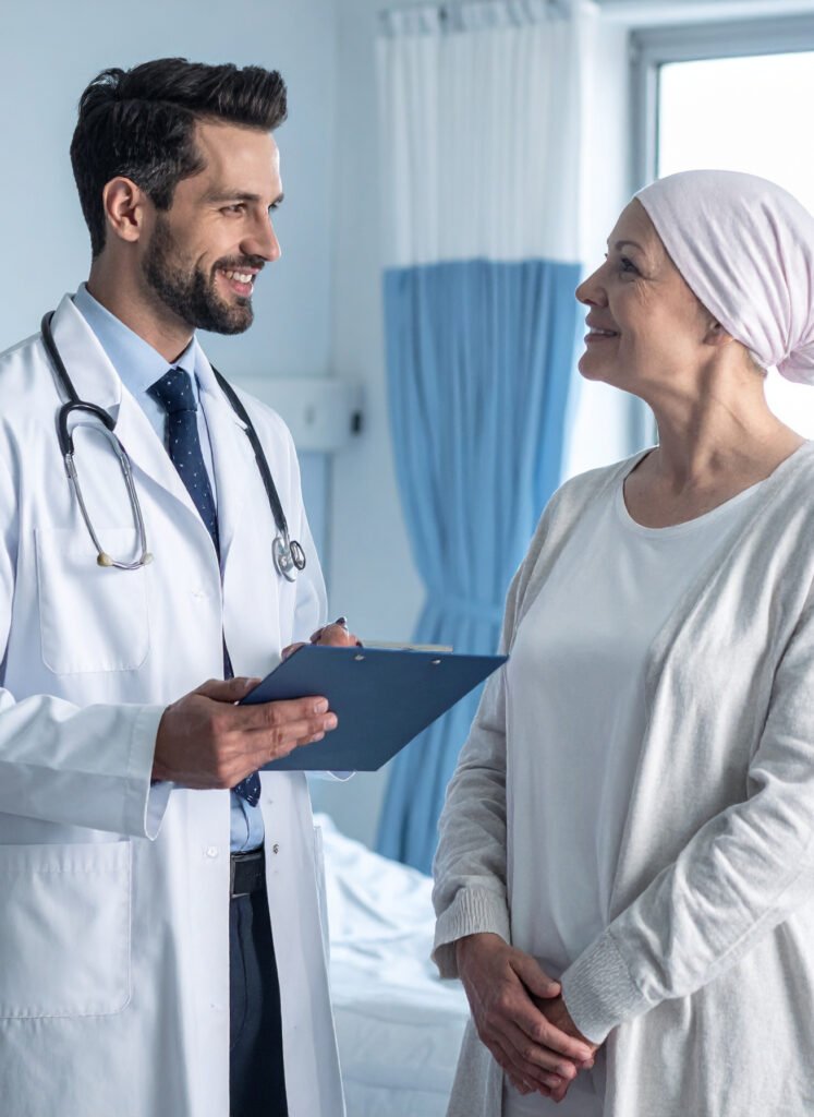 Cancer patient discussing treatment options with her doctor